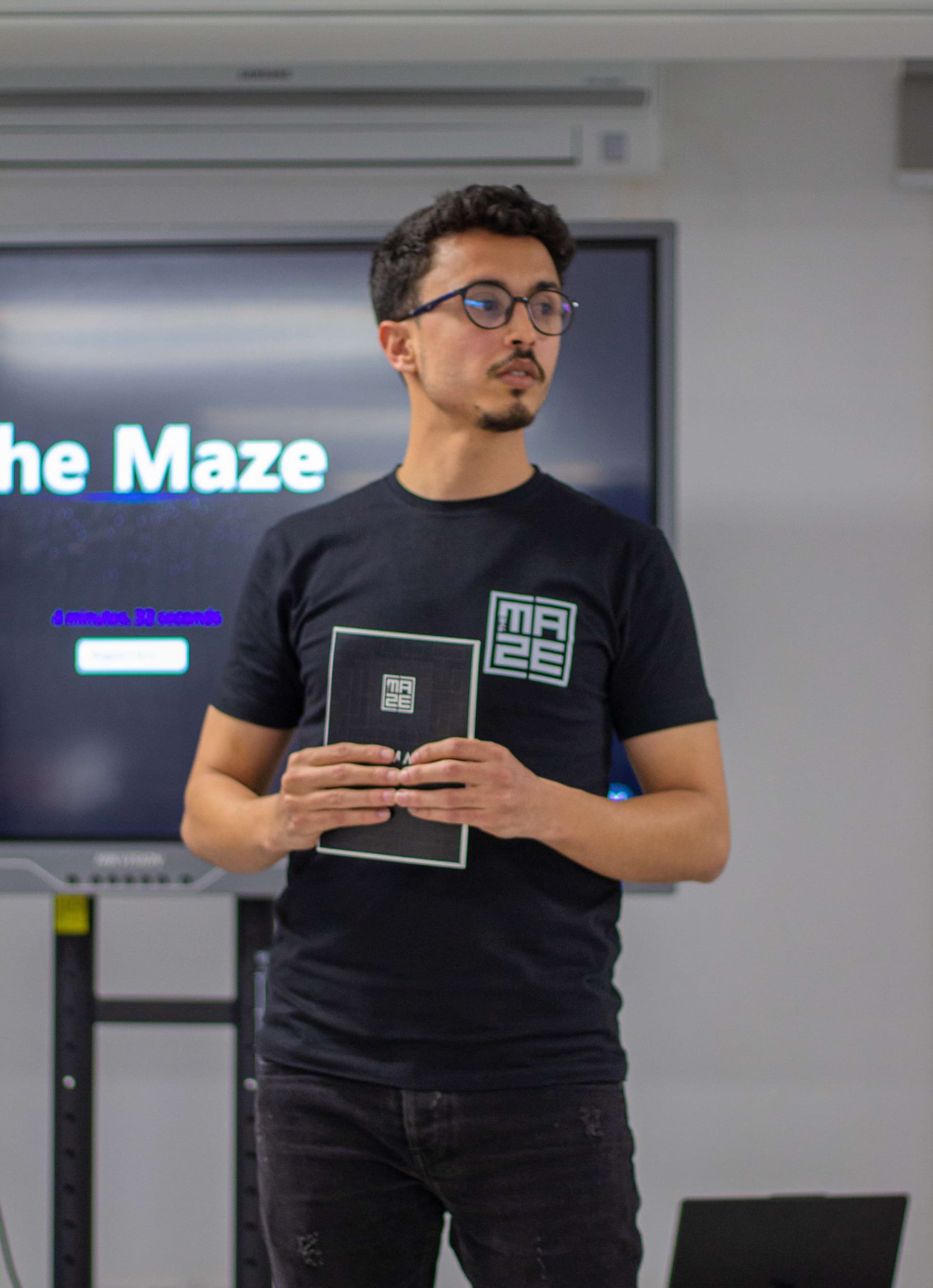 Malek khannoussi get rewards for winning a hackathon between universities in tunisia